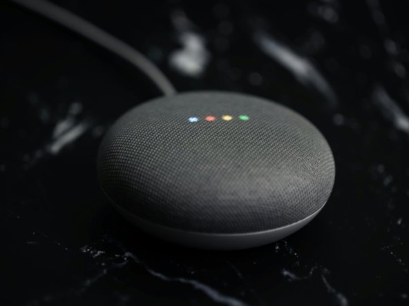 a google home mini sitting on top of a table